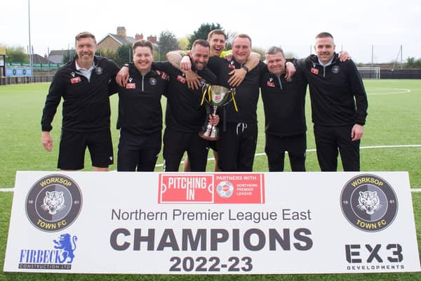 Craig Parry celebrates title glory with his players. Photo by Lewis Pickersgill