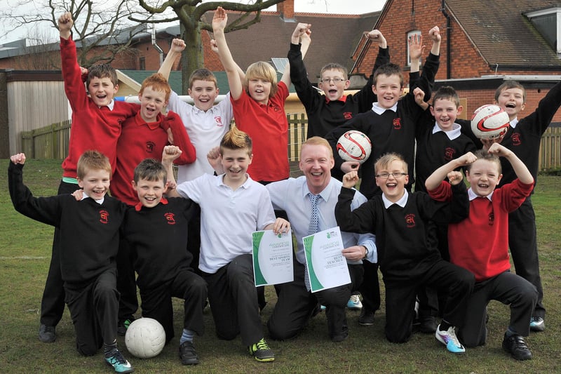 Pupil Nathan Langley nominated teacher John Alexander for the Best Teacher Award and Redlands Boys Football team for the Best Sports Team award.  Nathan is pictured centre with Mr Alexander and the Redlands Boys Football team in 2014.