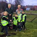 Councillor Neil Clarke and Julie Adams (Veolia) with pupils from Sparken Hill Academy