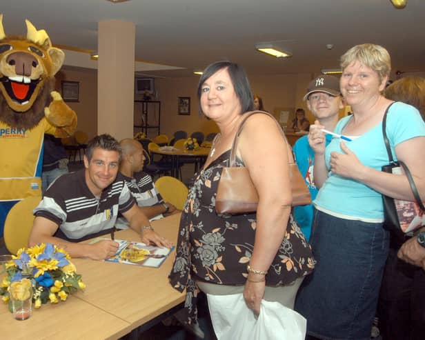 Stags skipper and fan's favourite Richie Barker signs autographs for fans at the open day held at Field Mill in 2006