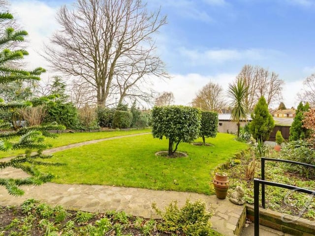 Whichever angle you look at it, the green oasis of the rear garden at the Pump Hollow Lane bungalow has you dreaming of warm, summer days.