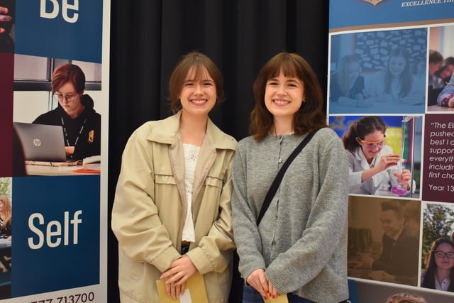 Olivia Taylor and Jessica Taylor at The Elizabethan Academy this morning. Between them they received three A*s and three As in photography mathematics, economics and mathematics, sociology and philosophy & ethics.