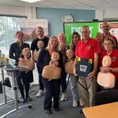 The team from Specsavers Retford learn life-saving skills from Retford Lions Club members