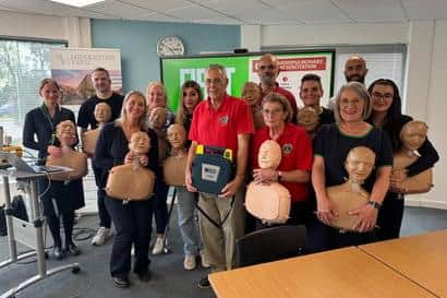 The team from Specsavers Retford learn life-saving skills from Retford Lions Club members