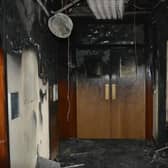 The wrecked aftermath of the Conservative group's corridor where the fire started