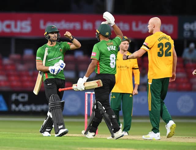 Naveen-ul-Haq celebrates hitting the winning runs with Ben Mike during the Vitality T20 Blast match between Leicestershire Foxes and Notts Outlaws. (Photo by Tony Marshall/Getty Images)
