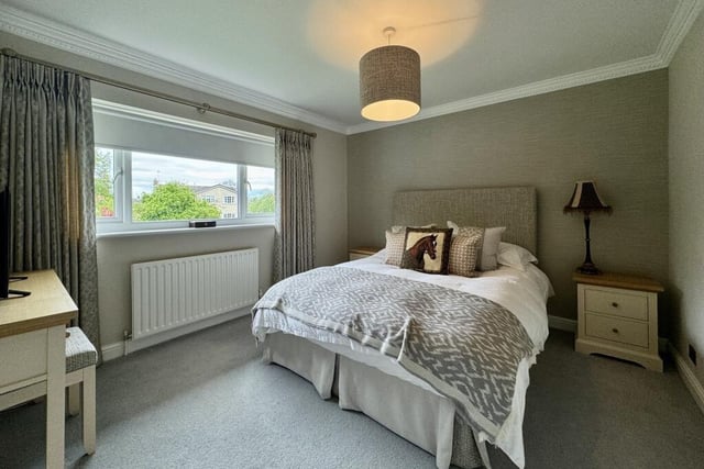 The second bedroom, facing the back of the £600,000-plus property, is a generously-sized double for guests and has access to an en suite shower room.
