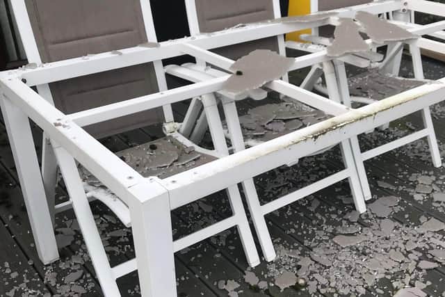 Damage to garden table caused by golf ball from KIlton Forest Golf Club
