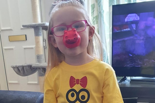 Little Micah Rose Clay, age three, wore her cute nose with pride on Red Nose Day.