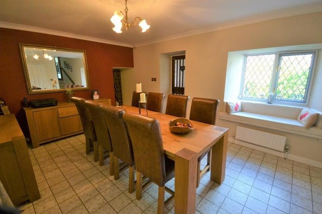 In between the sitting room and the breakfast kitchen sits this formal dining room, which is ideal for family meals or for entertaining friends.