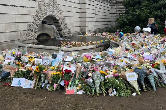 Hundreds paid tribute to the Queen by laying floral tributes.