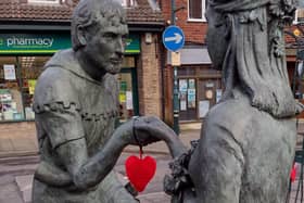 A heart on the statue of Robin Hood and Maid Marian in Edwinstowe.