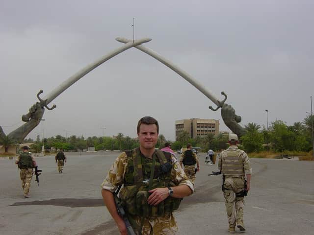 Holistic well-being coach, John Watson Allison, while stationed in Iraq with the Army.