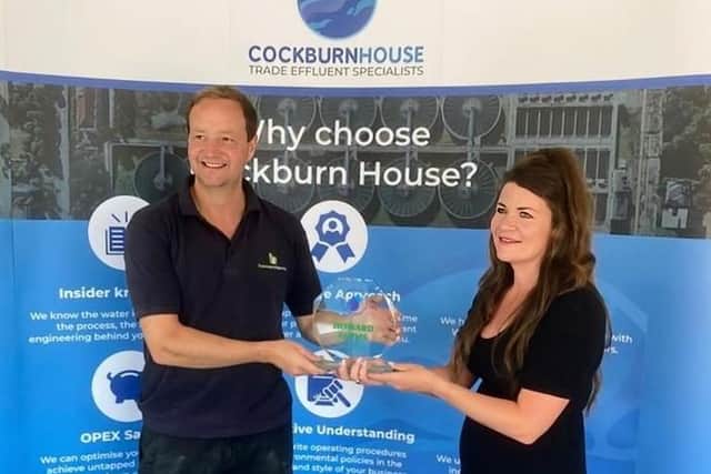 Howard Farms is presented with its award. Picture: Cockburn House