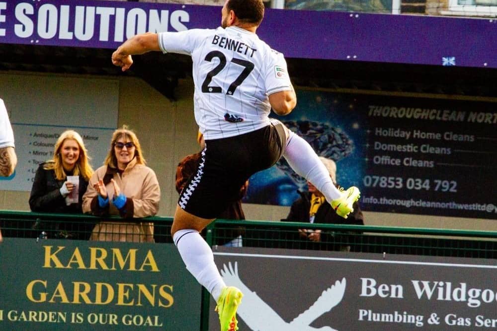 New Worksop Town loanee Mason Bennett celebrates a debut goal at Buxton, Pic: Zac Constantine