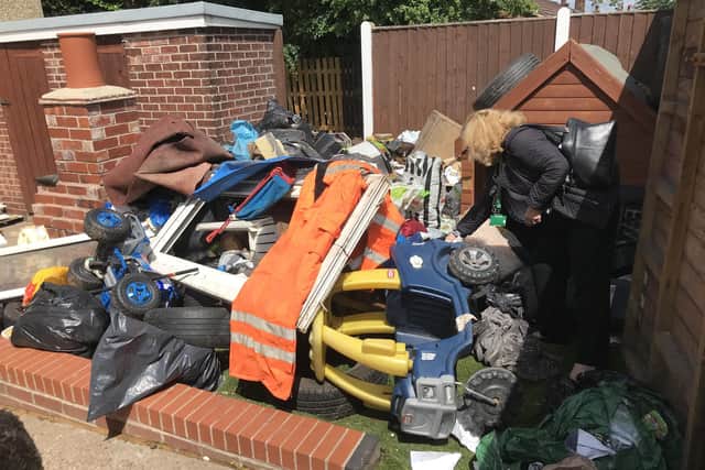 A huge amount of waste was found in the garden of a vacant home on Mendip Court, Carlton in Lindrick.