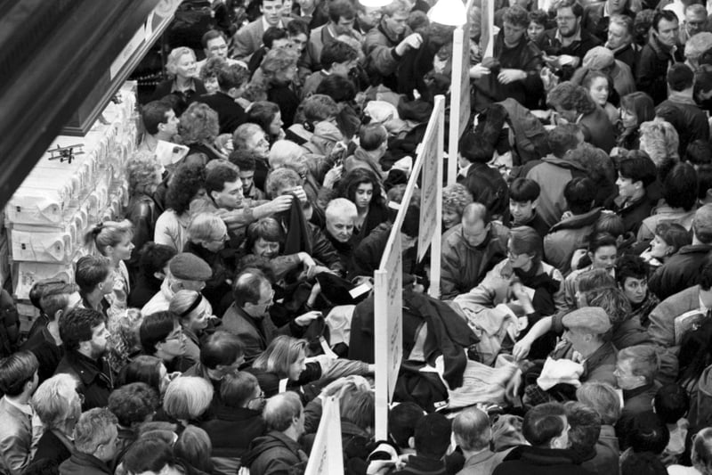 Looking down on to the shoppers at Jenners department store's winter sales in December 1991.