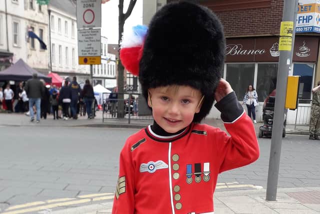 A mini Royal Guard saluted to visitors as the town celebrated the Jubilee.