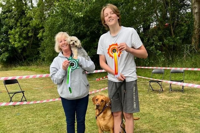 Crazy K9's dog show was very busy with many gorgeous pups entered. Pictured are the best in show and reserve best in show winners.