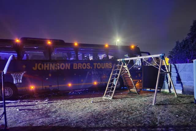 A Johnson Bros coach drove into a property's front garden in Thievesdale.