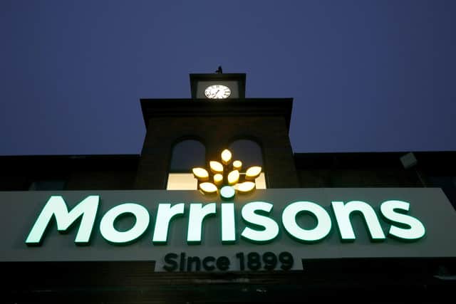 Morrisons supermarket signange is seen illuminated (Photo by Christopher Furlong/Getty Images)