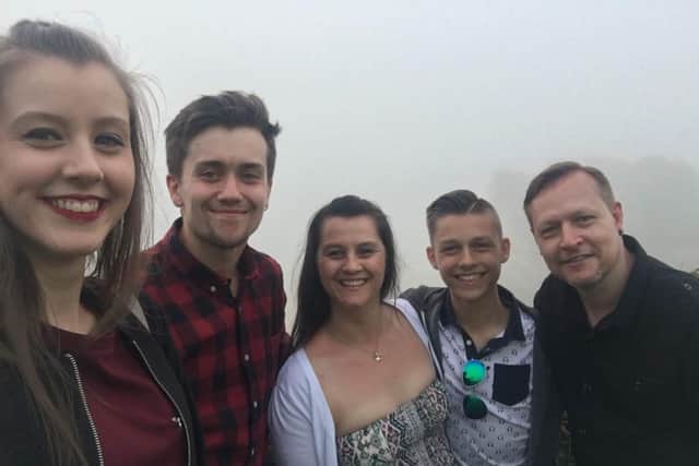 Pictured with Ian (right) and his wife Nicola (centre) are, from left to right, their daughter Phoebe, her fiance Ryan Towner, and Ian and Nicola's son Oliver.