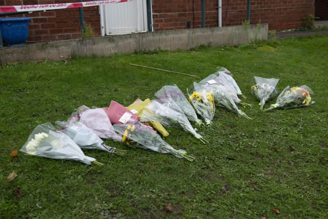 Flowers left at the scene of the murder on Rayton Spur, Kilton, in November last year.