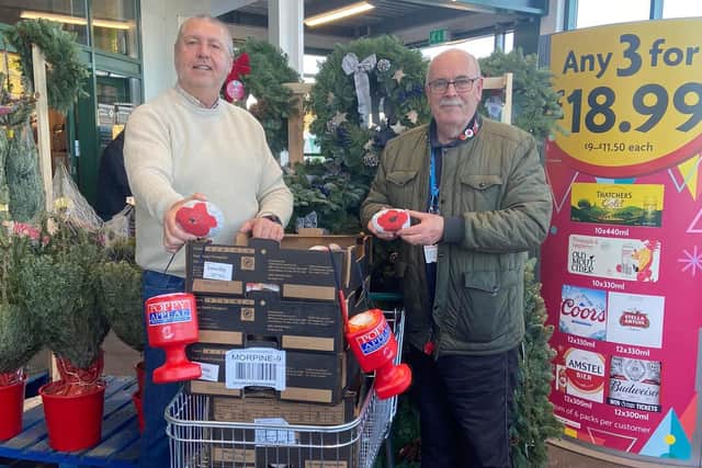 Left to right: Tim Lewis and Grant Cullen after collecting the five boxes of Remembrance pebbles. Credit: Vicky Brooks