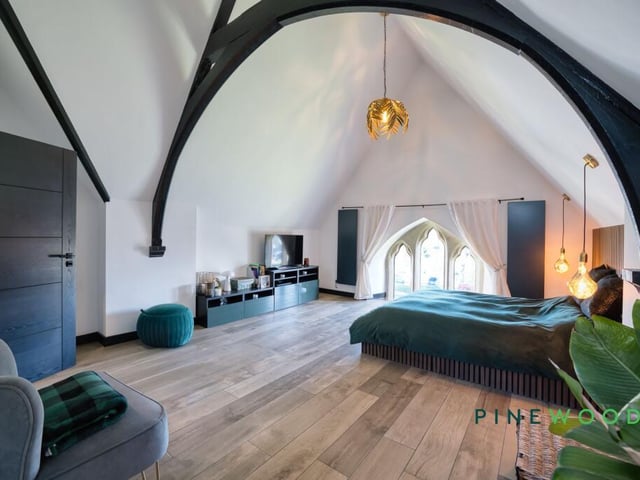 Another of the bedrooms, with stunning architectural features.