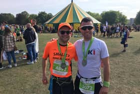 Tom Briggs (left) and guide runner Andrew at the end of the Robin Hood half marathon.