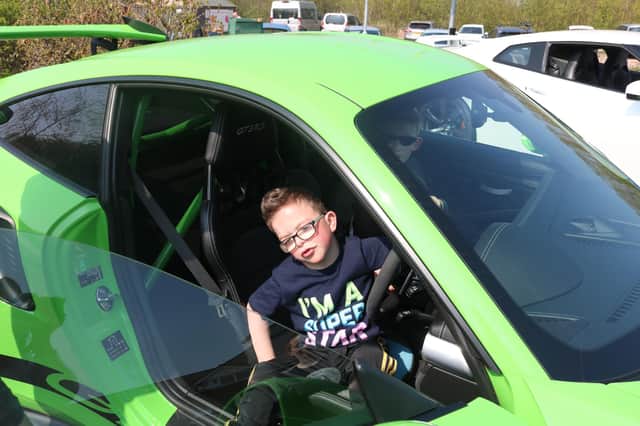 Jacob White from Maltby checks out out a supercar.