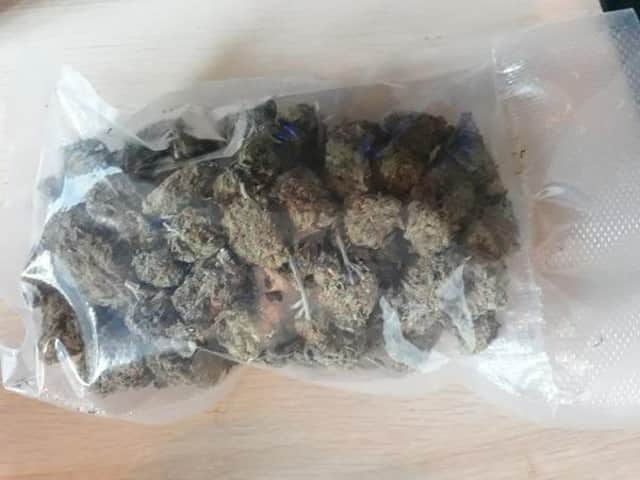 Cocaine, cannabis and cash were seized from the semi-detached property in Roman Road