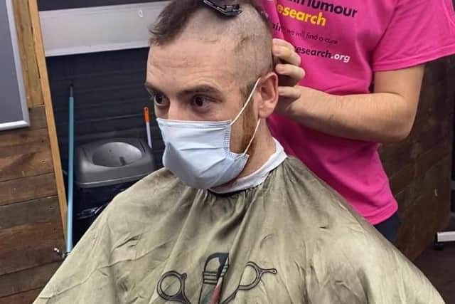 Friend Sam Colbear has his head shaved raising money for Brain Tumour Research