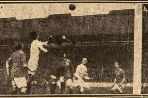 Tom Fern punching the ball clear for Everton in a match against Chelsea.
