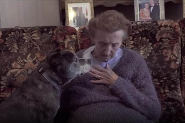 Ann acting in a scene where a rescue dog's owner falls ill