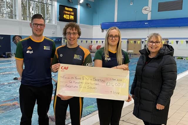 Bassetlaw Swim Squad presented the cheque to FOYPIB's Noelle Barron, pictured on right, at Retford Leisure Centre.