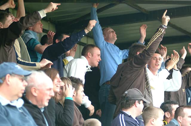 Worksop Town fans cheer their team on in a match against Moor Green in 2007. Photo: Mark Fear.
