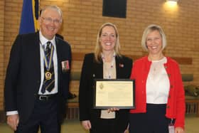 (L to R)   Mr David Sneath, President Nottinghamshire RBL with Nina Villa presenting the award to Nicola Kirby