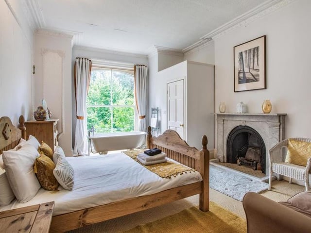 Another bedroom, which is notable for its roll-top bath located against the large sash window. Oozing comfort, the room also has its own WC.
