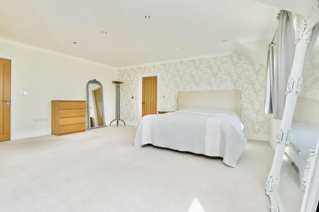 Swiftly upstairs now for a look at the impressive master bedroom, which boasts a walk-in wardrobe, en suite bathroom and Juliet balcony.