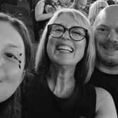 Bethan Ellicott (centre) with daughter Lacey and partner Mark.
