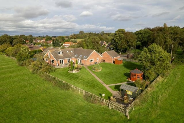 In this aerial shot, you can spot a quirky summer house in the back garden