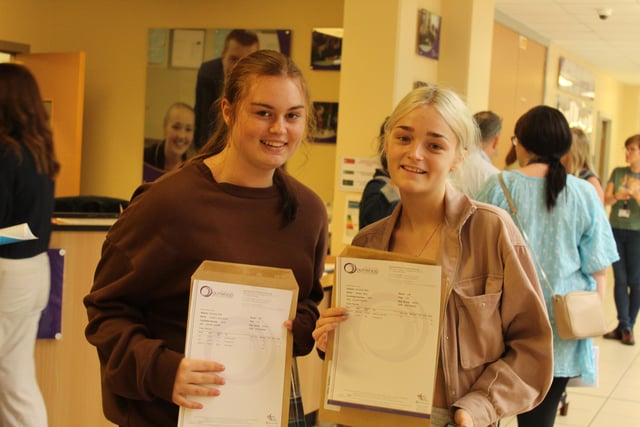 Friends Lauren Smith and Amber Slinn celebrate their great results.