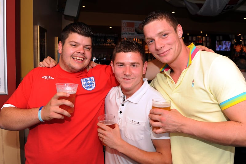 Pictured ahead of the Slovenia vs England World Cup game is Adam Baines, Sam Commings and Richard Brooks.