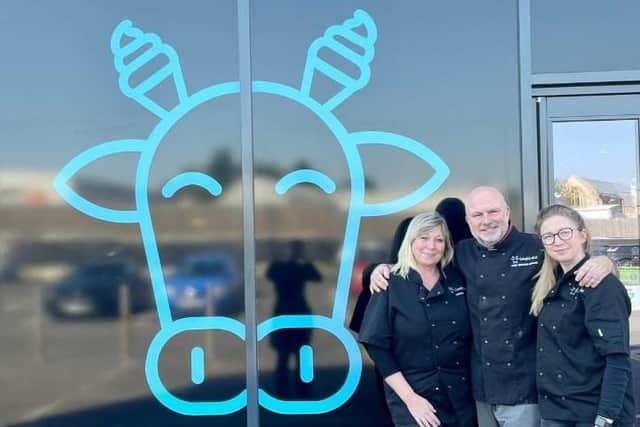 Husband-and-wife duo Phil and Carol Holvey alongside daughter Jess outside Smoke&Ice.