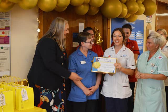 Representatives from NHS England visited ward 17 to congratulate the team and present them with their certificate.