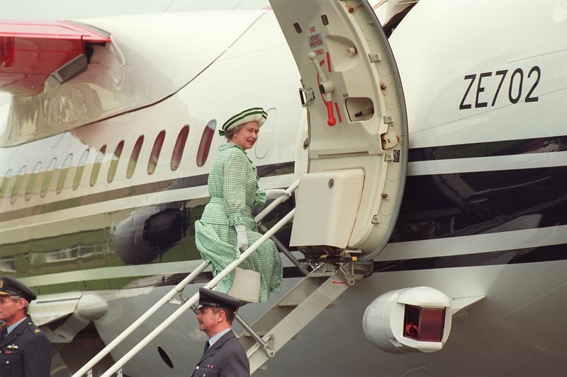 The Queen boards an aeroplane of the RAF's Royal Squadron at Turnhouse after a Royal visit to Edinburgh.