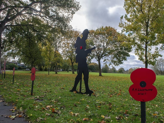 Tributes to the fallen are placed throughout the village.