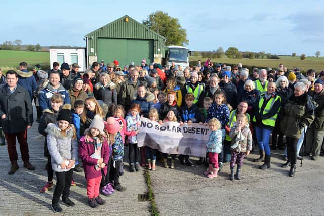 Residents and politicians gather in protest against plans for a solar farm at West Burton. (Picture: Sally Outram).