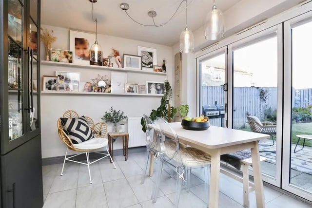 A closer look at the bright dining area within the open-plan kitchen.